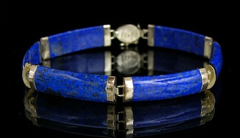 Appraisal: A Carved Lapis Lazuli Link Bracelet with Gold Clasp The