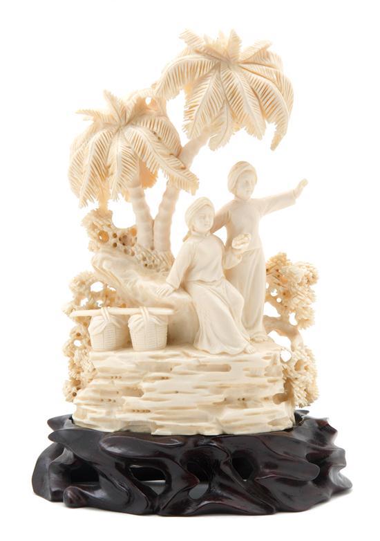 Appraisal: n Ivory Carving of an Oasis depicting two figures above