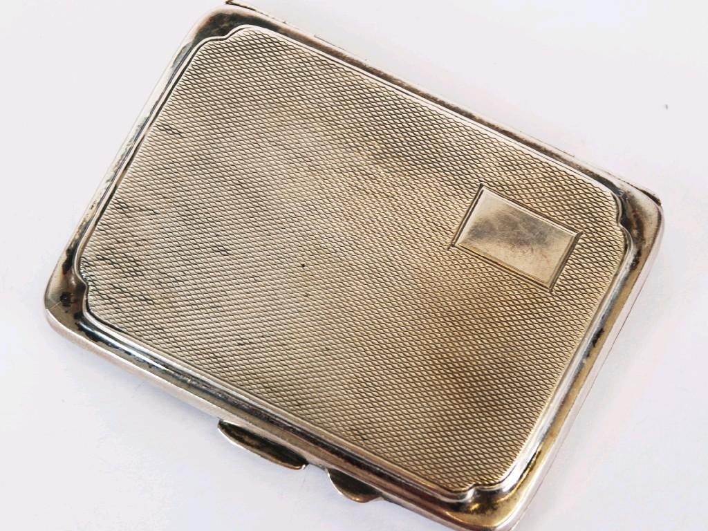 Appraisal: LADY'S SILVER POCKET CIGARETTE CASE oblong and engine turned with