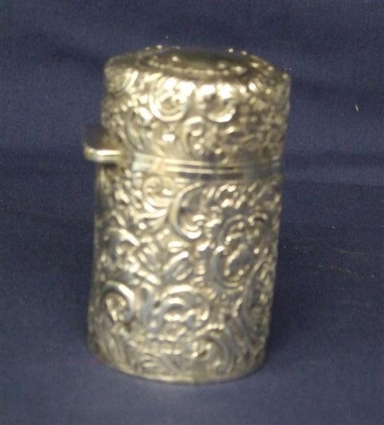 Appraisal: Late Victorian silver cased scent bottle with embossed scrolling foliage