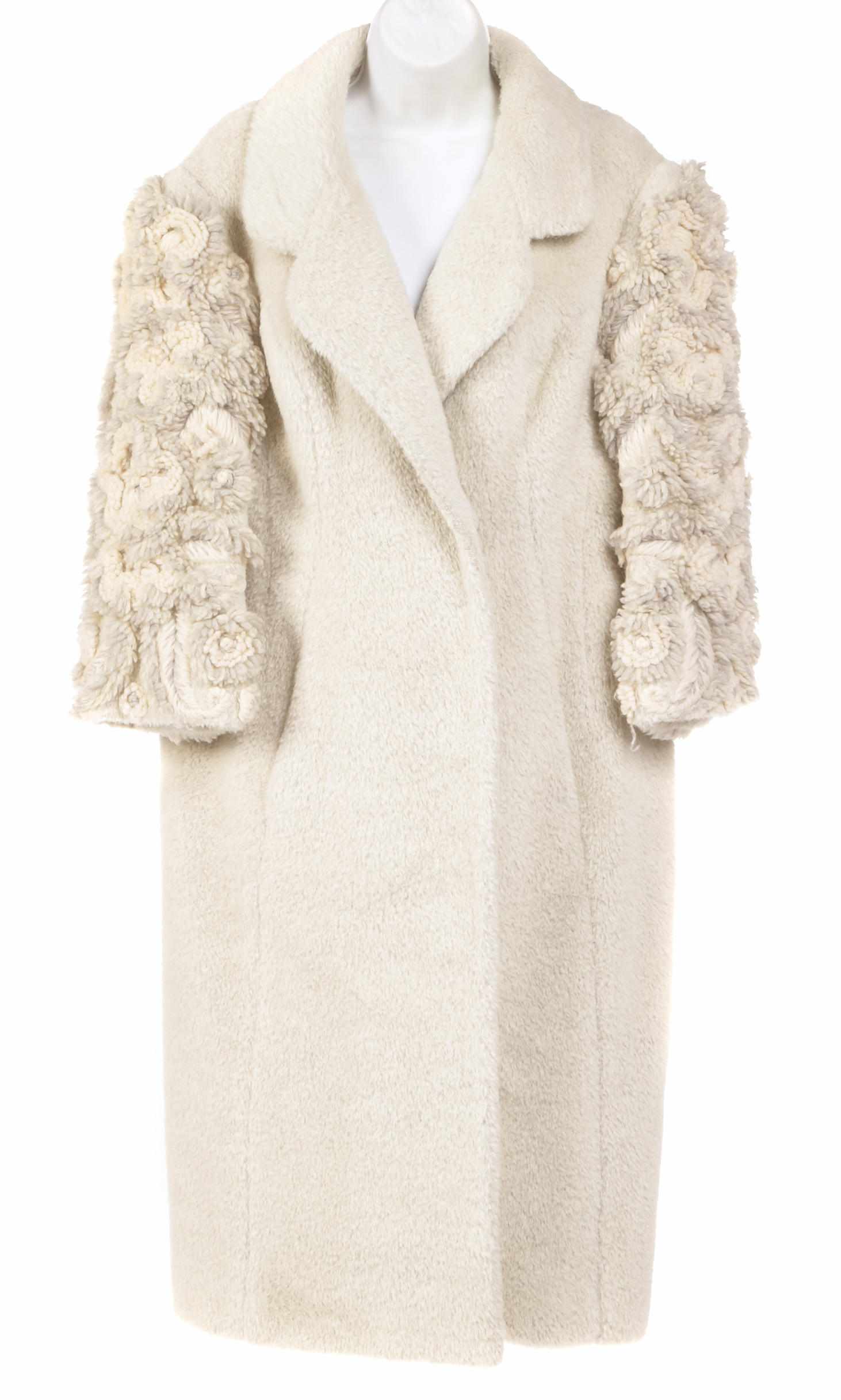 Appraisal: A Galanos cream wool embroidered sleeve coat no size labeltogether