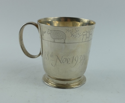 Appraisal: Silver christening mug decorated with nursery rhymes hallmarked London grams