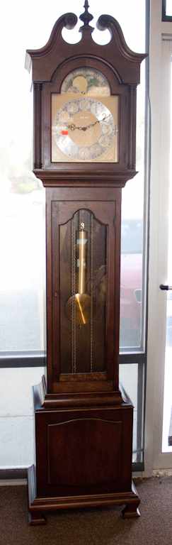 Appraisal: Howard Miller mahogany tall-case clock Estimate - No condition report