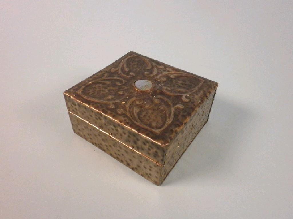 Appraisal: An Arts Crafts style hammered pewter cigarette box inset with