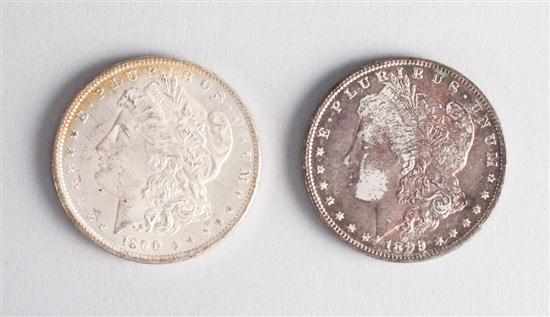 Appraisal: Two United States Morgan silver dollars MS- and AU- toned