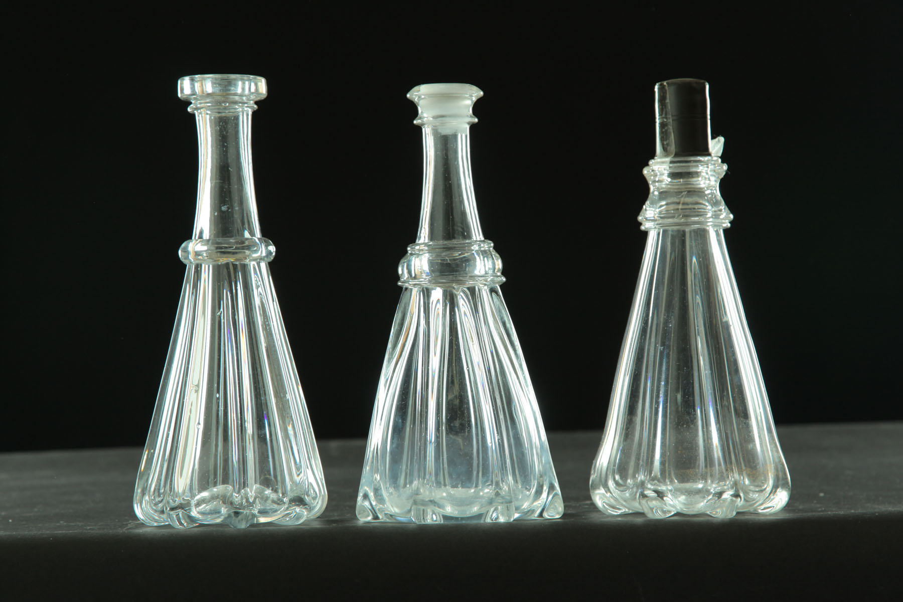 Appraisal: THREE PILLAR MOLD BOTTLES Pittsburgh mid th century blown glass