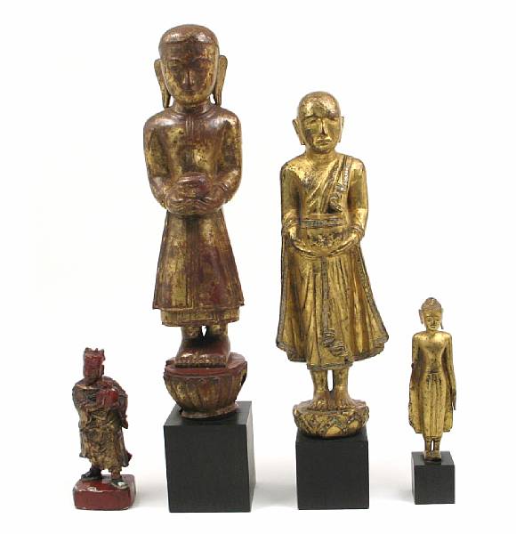 Appraisal: A group of four Southeast Asian gilt and red laquer