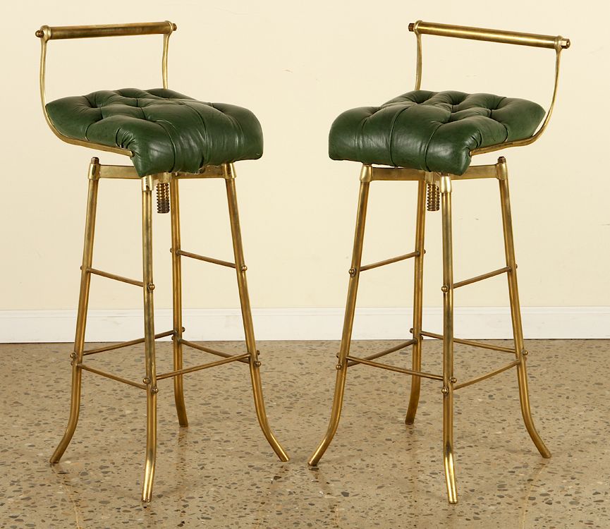 Appraisal: PAIR BRASS BAR STOOLS SWIVEL SEATS CIRCA A pair of