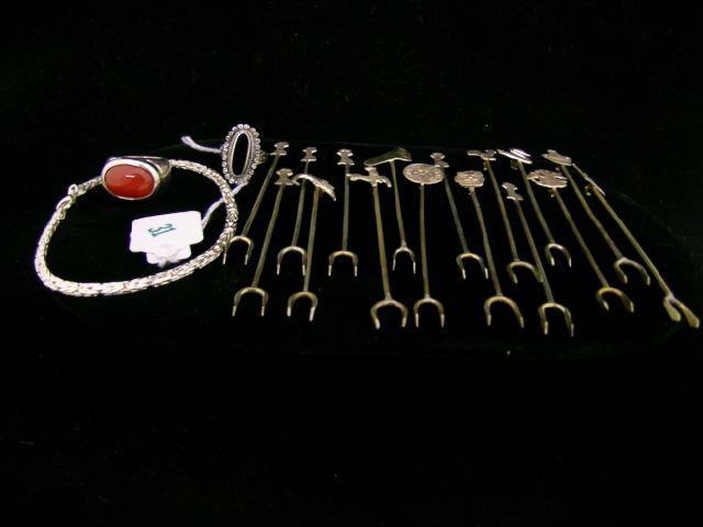 Appraisal: Group of silver jewelry and canape picks including silver ring