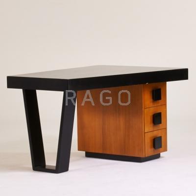 Appraisal: GILBERT ROHDE Asymmetrical desk USA s Mahogany lacquered wood Unmarked