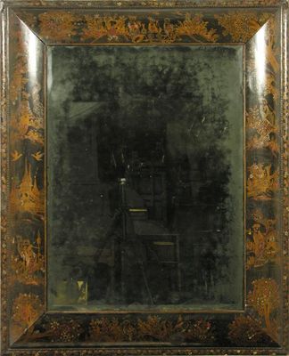 Appraisal: A large chinoisiere decorated cushion frame wall mirror with a