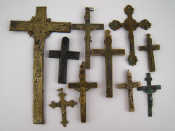 Appraisal: A mixed lot comprising eight crucifixes a cross missing corpus