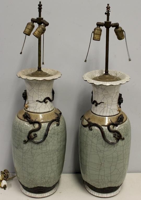 Appraisal: Pair of Celadon Crackle Glazed Vases as Lamps th Century