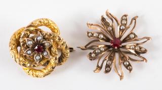 Appraisal: K flaming sun pin with round ruby set in the