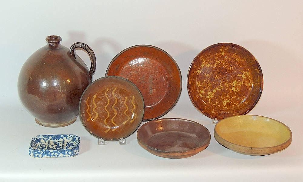 Appraisal: Earthenware Grouping Seven pieces of earthenware including a slip decorated