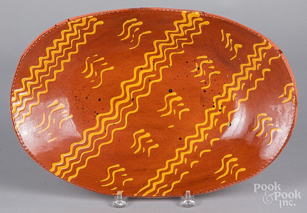 Appraisal: Breininger redware loaf dish Breininger redware loaf dish h w