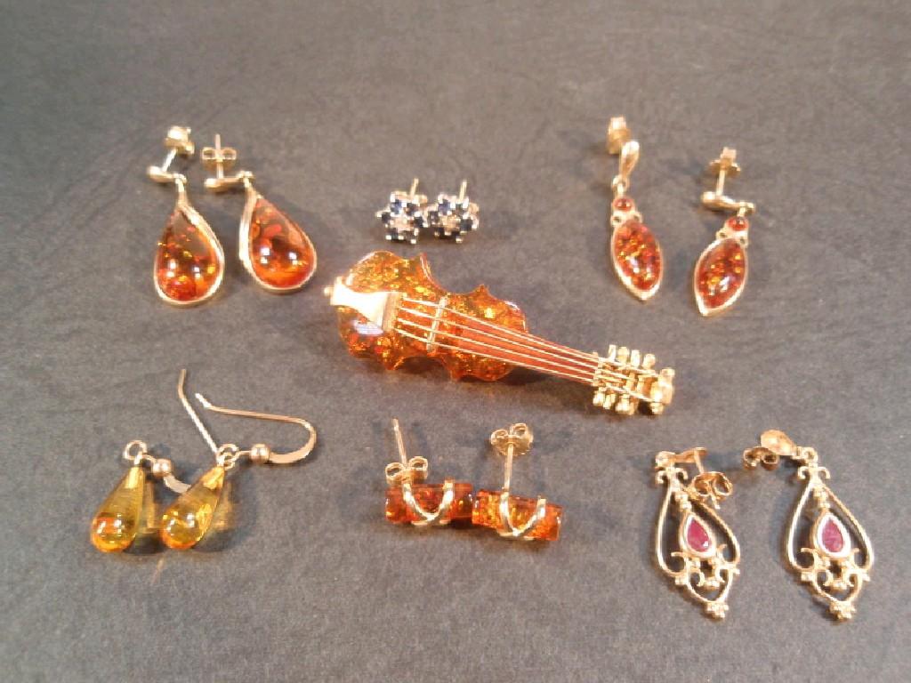 Appraisal: Various stone set earrings together with an amber stone coloured