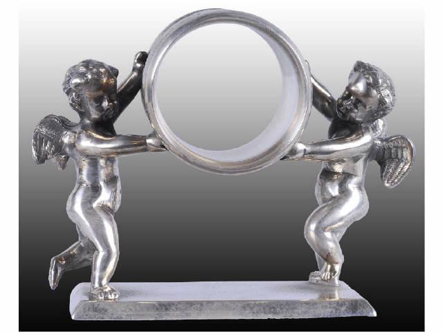 Appraisal: Winged Cherubs Figural Napkin Ring Description Two tall standing winged