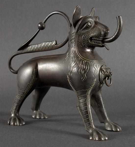 Appraisal: Tibetan patinated bronze fanciful lion figural oil lamp th century