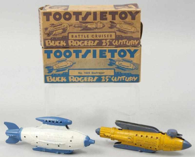 Appraisal: Lot of Tootsietoy Buck Rogers Spaceship Toys Description Cast metal