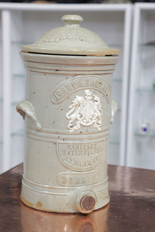 Appraisal: STONEWARE LIDDED WATER FILTER COOLER Manchester England by Slack and