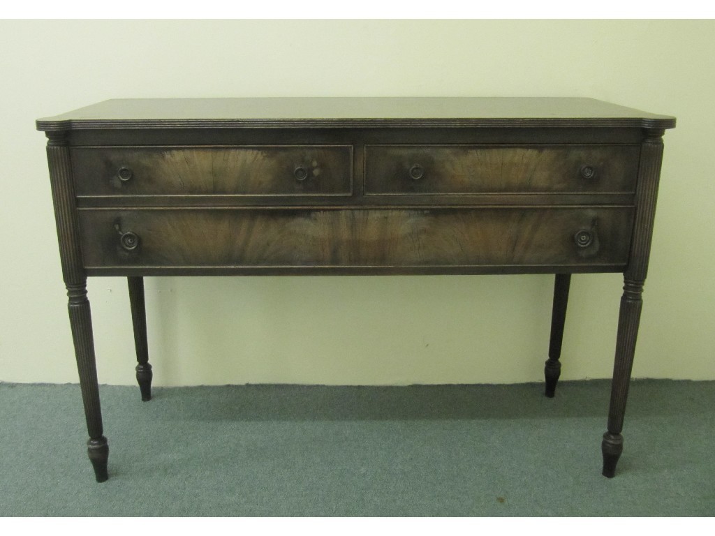 Appraisal: A mahogany chest of drawers by Grand Rapids with two