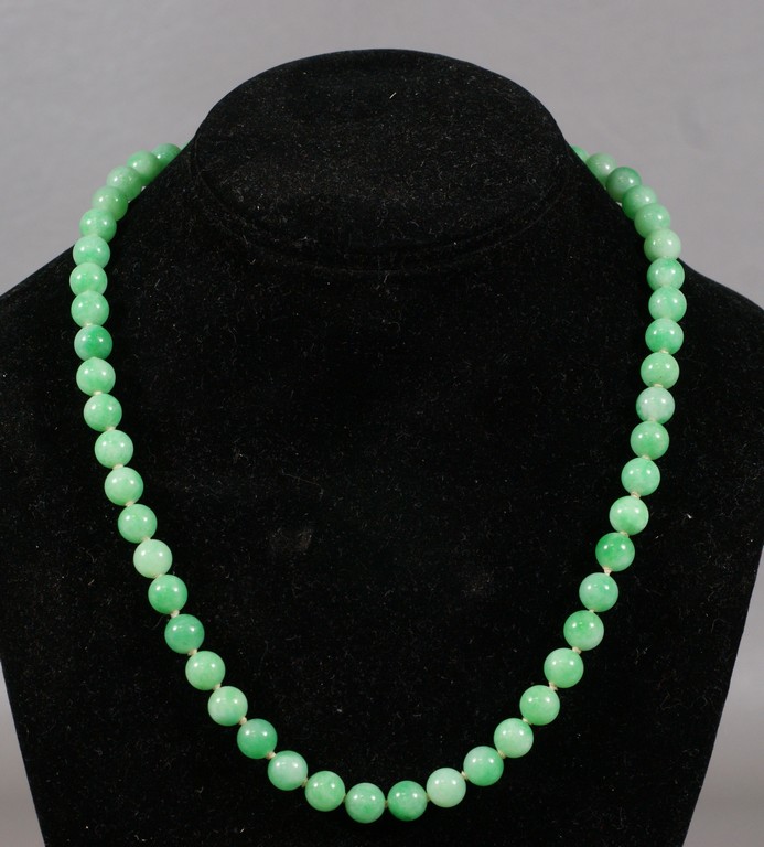 Appraisal: Jade bead necklace unmarked white gold and diamond catch long