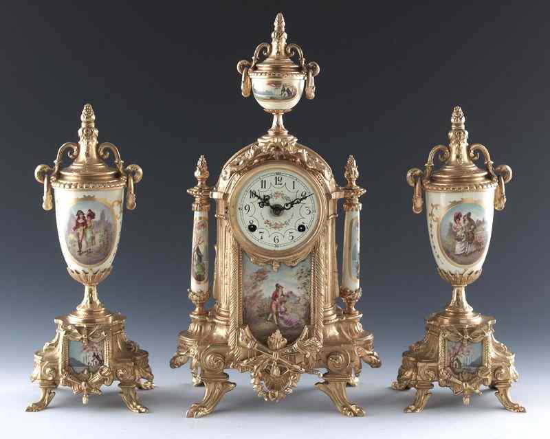 Appraisal: Pc Louis XVI style porcelain and bronze clockgarniture set the