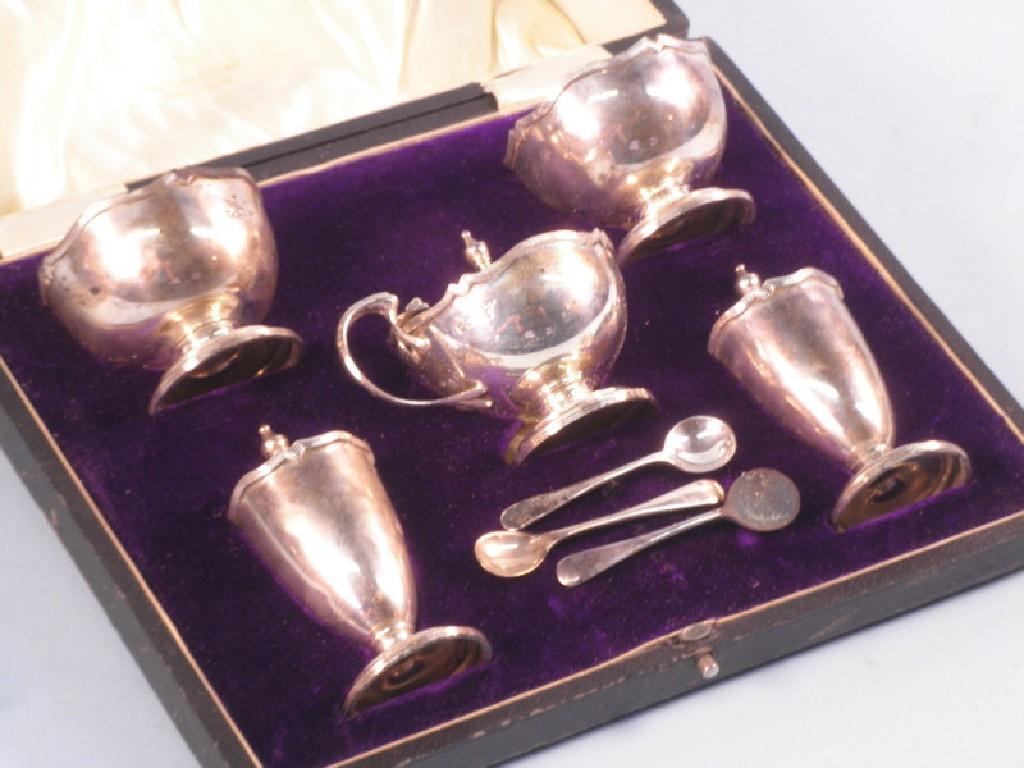 Appraisal: A silver cruet comprising of a circular mustard pot pair