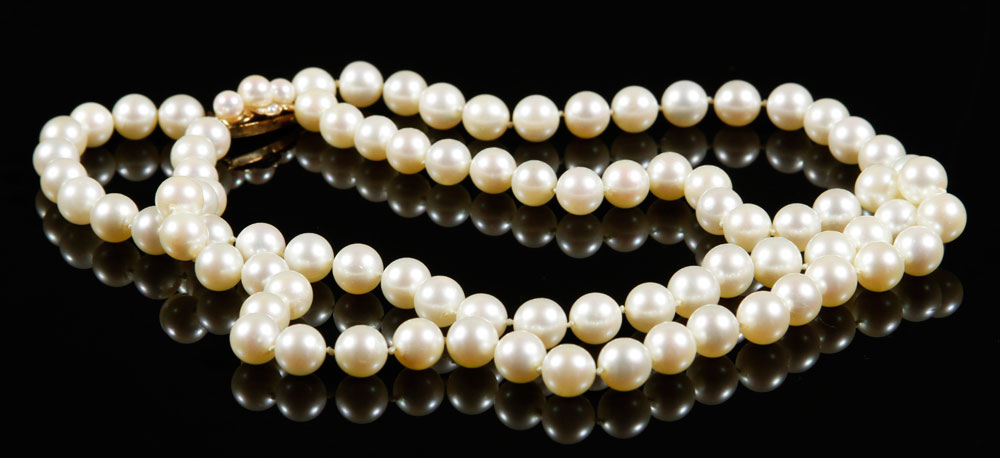 Appraisal: - White Pearl Necklace Lustrous white pearl double-stranded necklace with