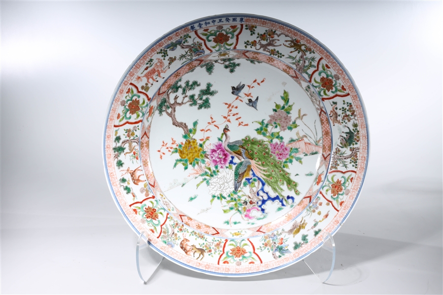 Appraisal: Large Chinese enameled porcelain charger with a central scene depicting