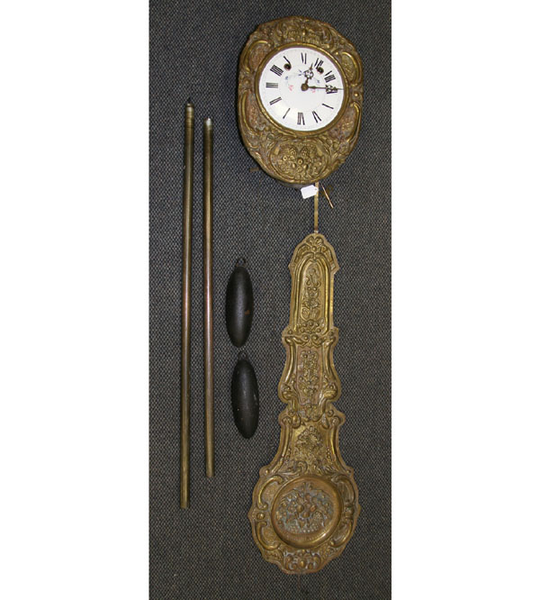 Appraisal: French wag-on-the-wall clock repousse brass case and pendulum painted face