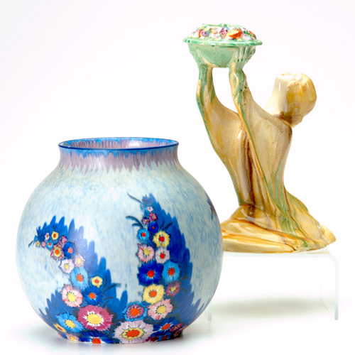 Appraisal: LONGWY Two vases enamel-decorated with blossoms Restoration to rim chips