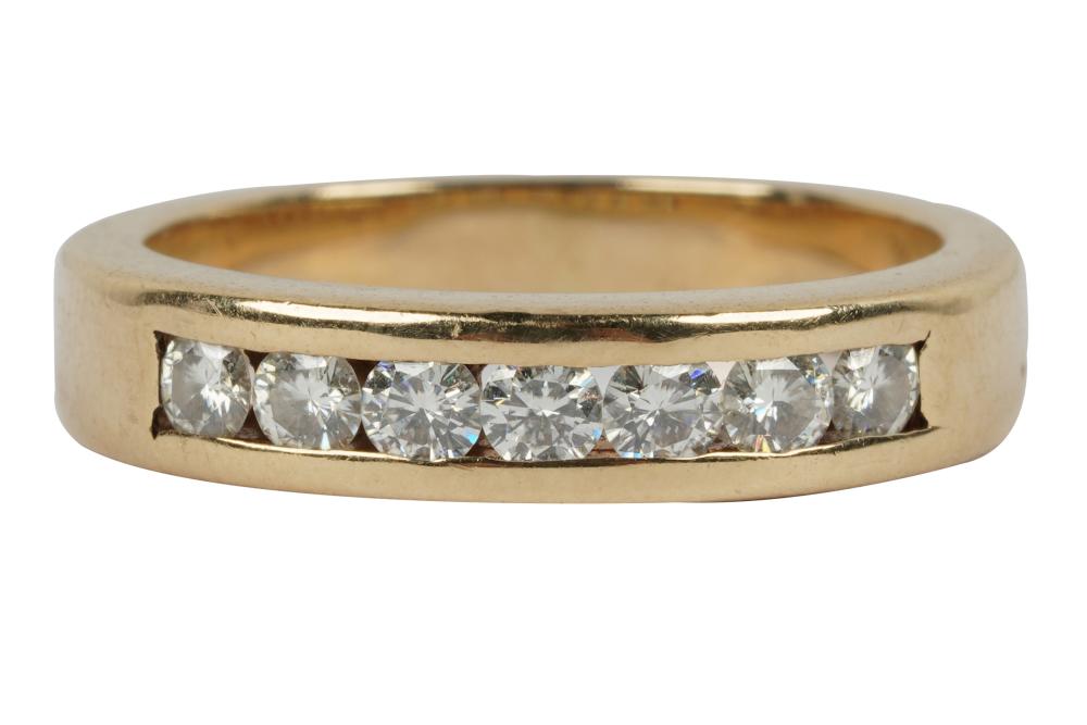 Appraisal: KARAT YELLOW GOLD DIAMOND BAND RINGcontaining seven full cut diamonds