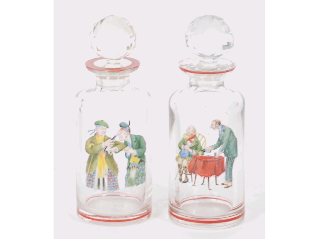 Appraisal: NEAR PAIR OF EARLY TWENTIETH CENTURY CYLINDRICAL PLAIN GLASS DECANTERS