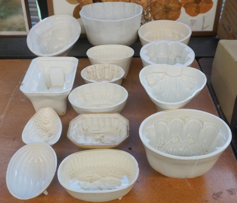 Appraisal: COLLECTION OF WHITE GLAZED CERAMIC FOOD MOLDS MOST FROM THE