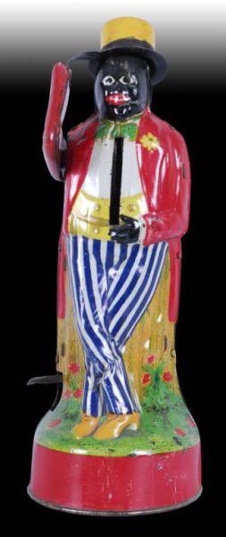 Appraisal: Cross-Legged Minstrel Mechanical Bank Description Tin Made in Germany Place