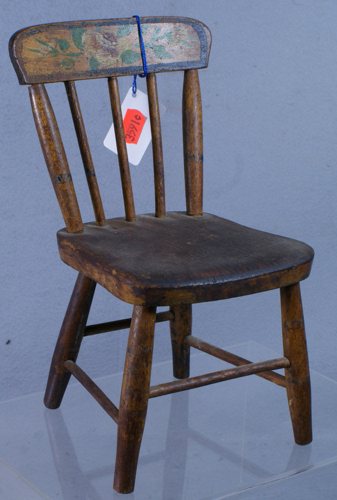 Appraisal: Miniature spindle back kitchen chair with floral painted decoration on