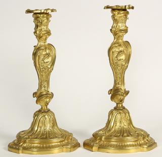 Appraisal: Louis XV style ormolu candlesticks Louis XV style ormolu candlesticks