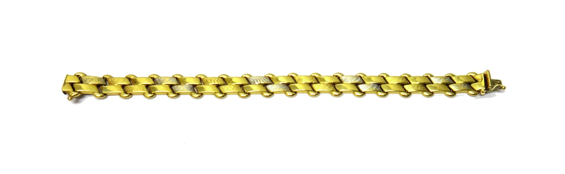 Appraisal: A gold bracelet in a two row slanting textured and