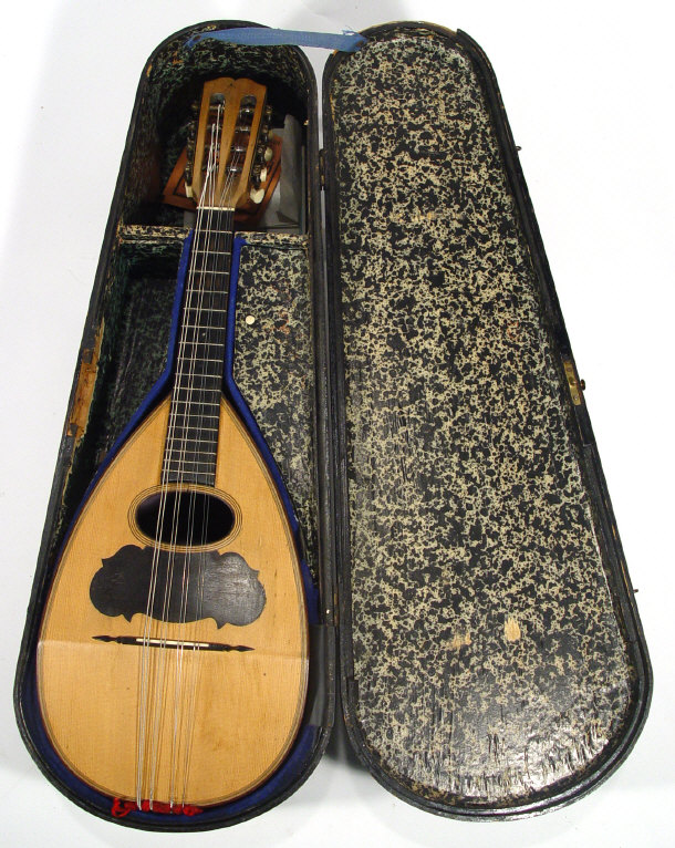 Appraisal: Melon shaped mandolin with strung inlaid back in original fitted