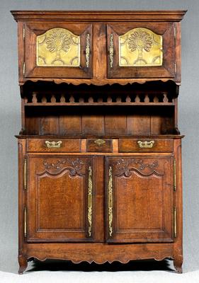 Appraisal: French Provincial carved oak hutch upper doors with punched brass