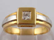 Appraisal: A yellow and white metal tests carat gold diamond solitaire