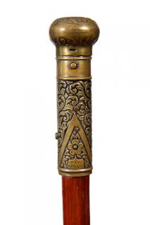 Appraisal: Candlestick Cane- Pat - A brass handle with a push