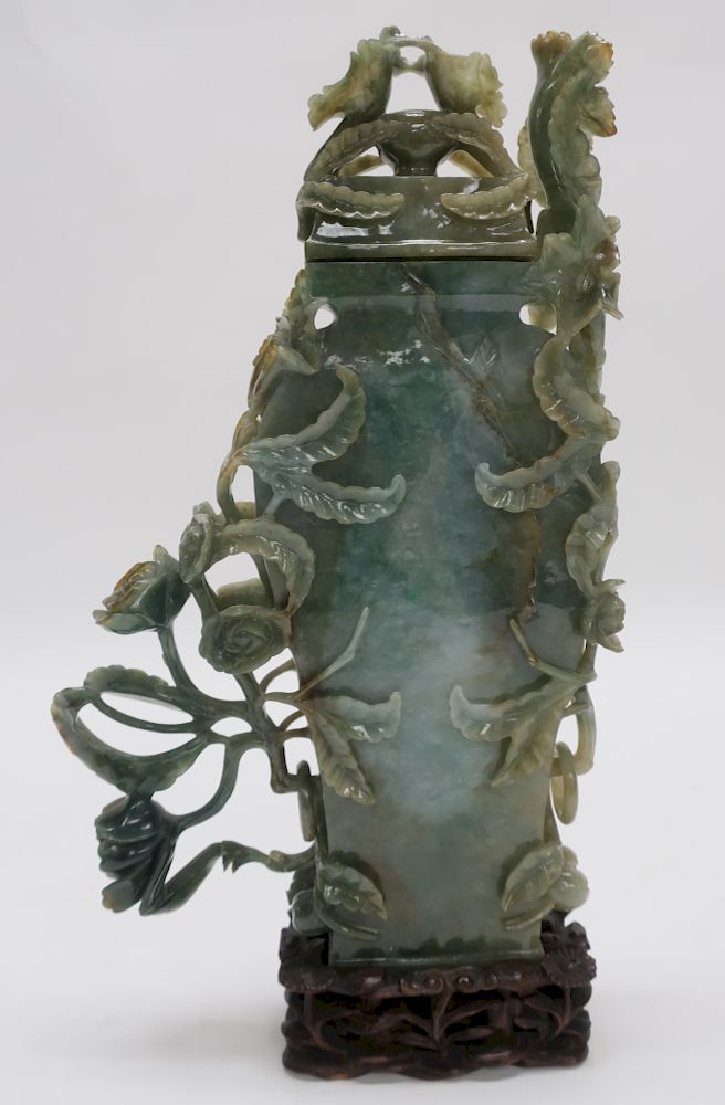 Appraisal: Chinese Carved Jadeite Vase Bluish green color carved with openwork