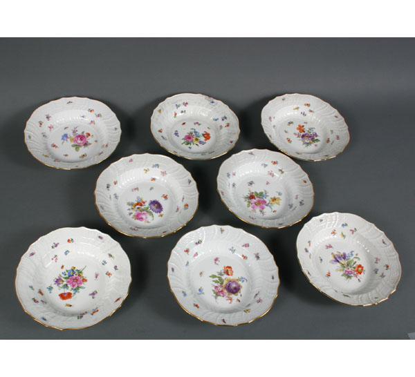 Appraisal: Eight Meissen porcelain bowls with gilt rim and hand painted