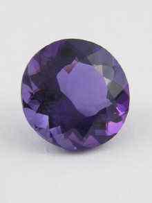 Appraisal: An unmounted amethyst measuring approx mm dia Approx ct