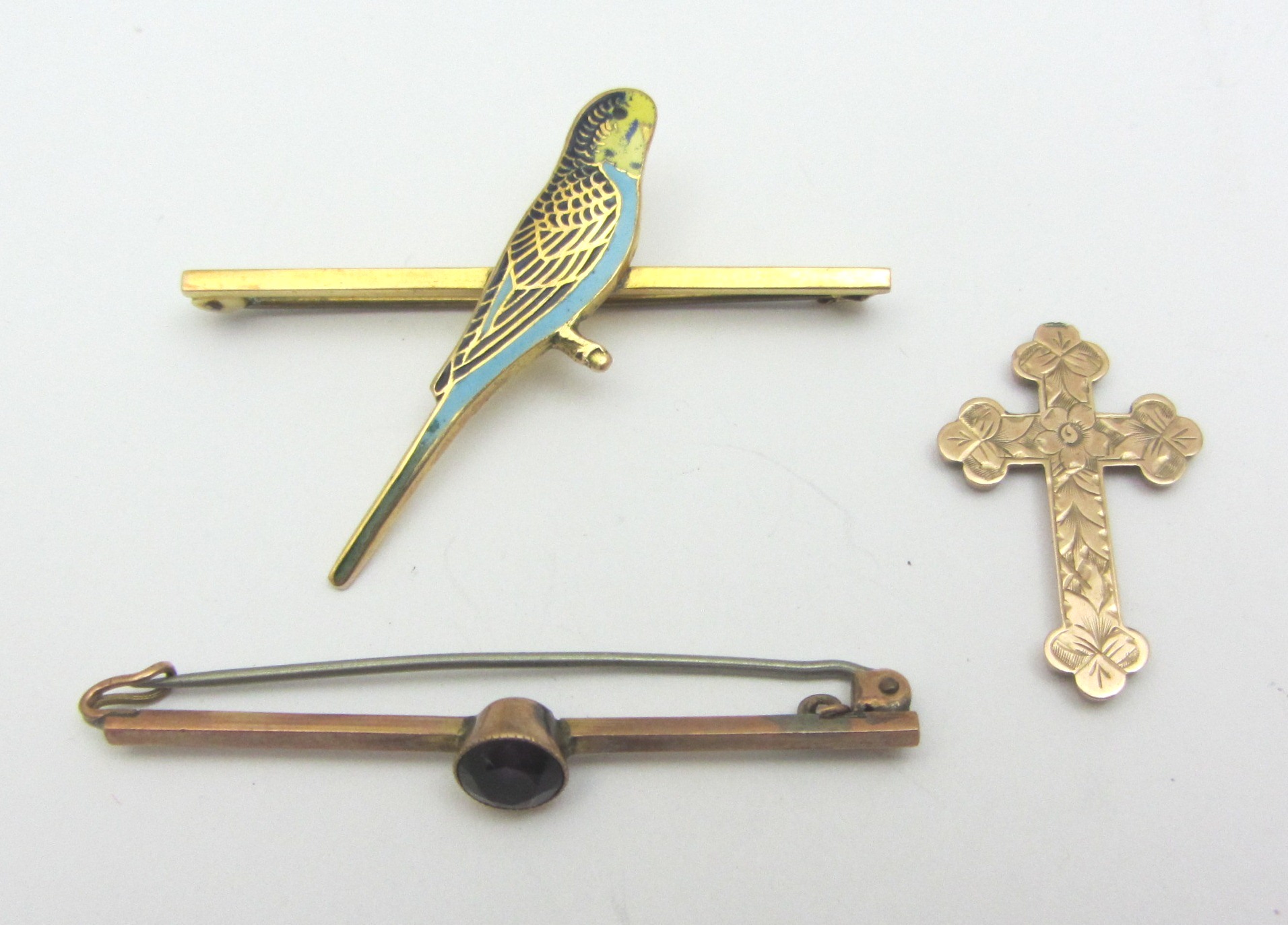 Appraisal: A gold and enameled brooch with a budgerigar motif detailed