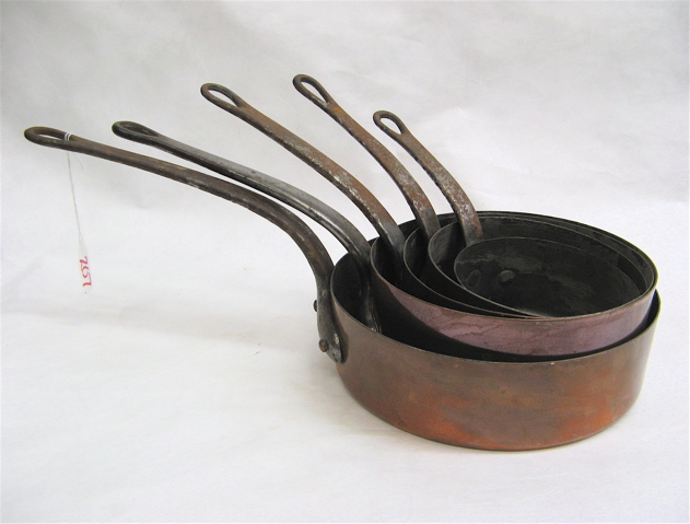 Appraisal: SEVEN PIECES COPPER CLAD COOKWARE graduating sized saucepans from D