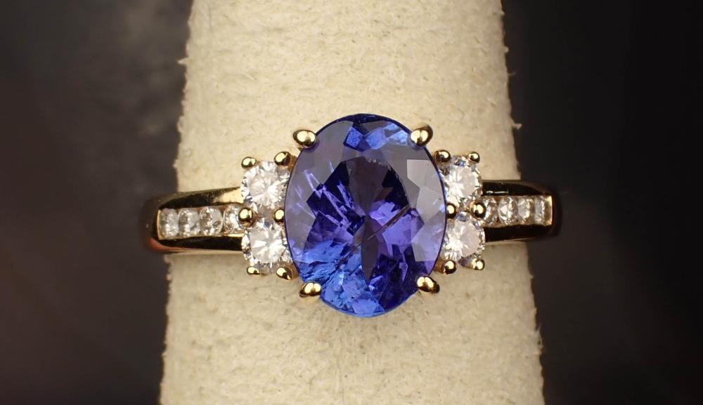 Appraisal: TANZANITE DIAMOND AND FOURTEEN KARAT GOLD RING The yellow gold